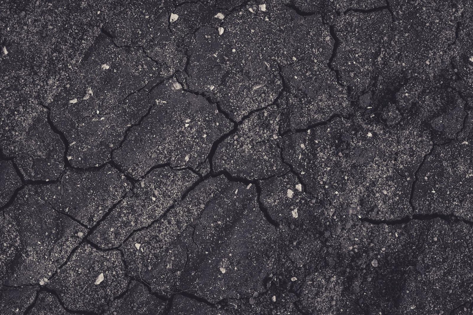Crack Filling vs. Repaving a Parking Lot: Which Do You Need?